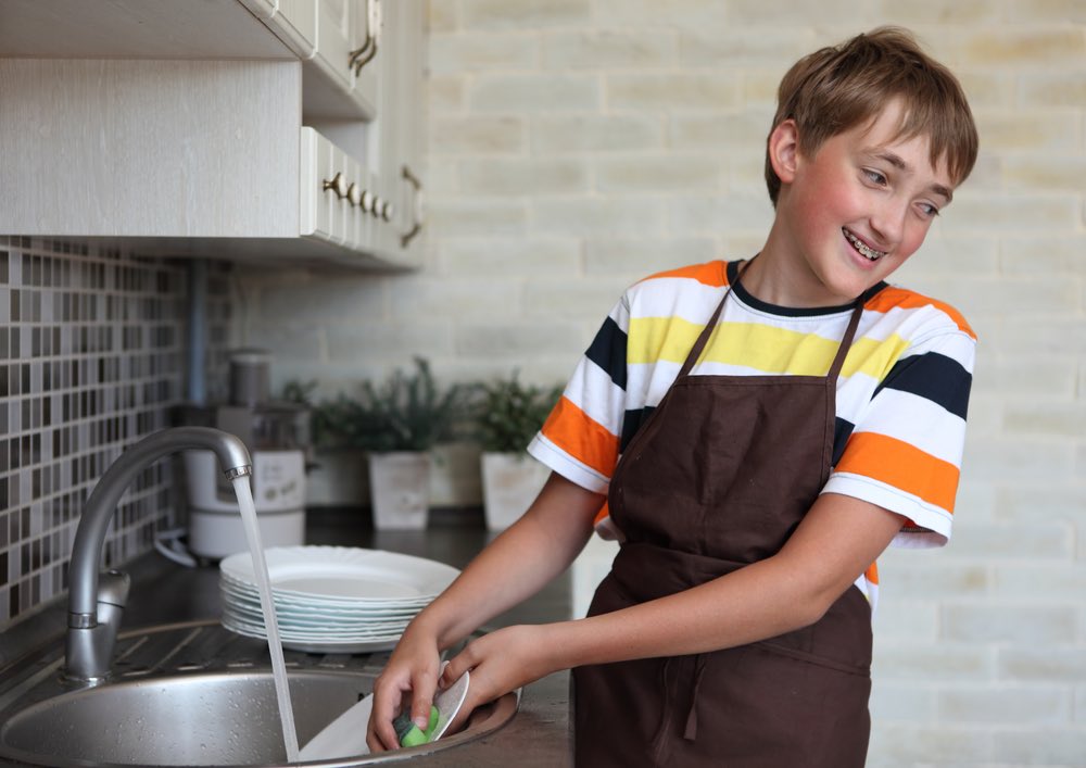 Delegating Teen Doing Dishes Teen Doing Dishes Smiling