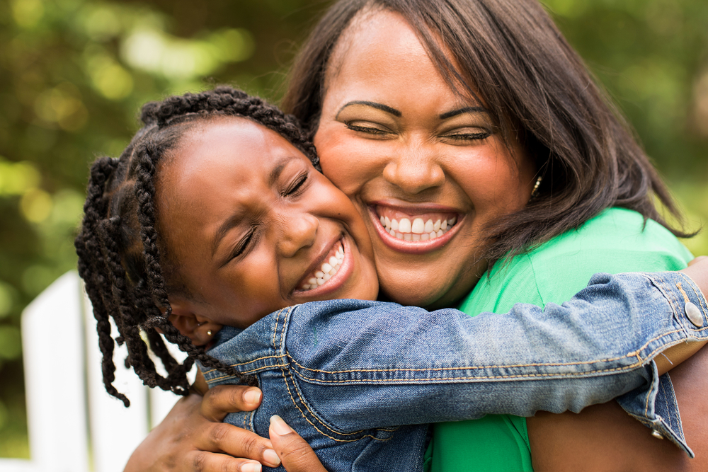 Very Happy Mom and Daughter Hugging