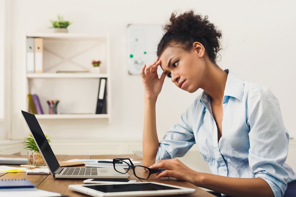 High Achiever recognize Stressed woman working at computer