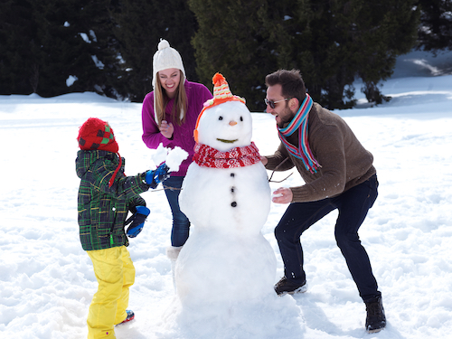 Family Playing in Snow