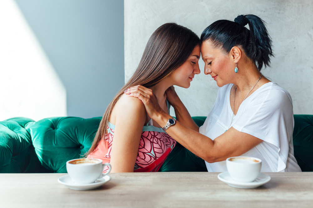 Mother and Daughter Talking Lovingly