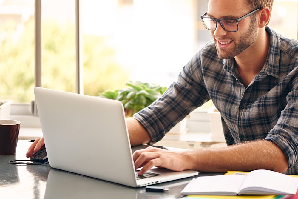 Uncertainty Entrepreneur Happy Man at Computer