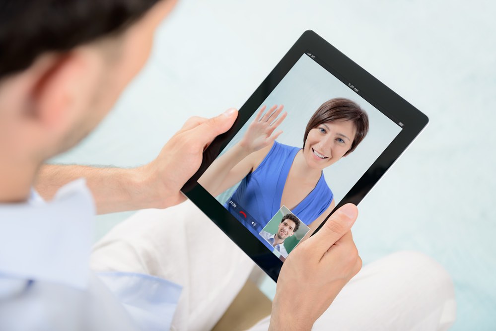 Vulnerability Connect Man talking with Woman on IPad